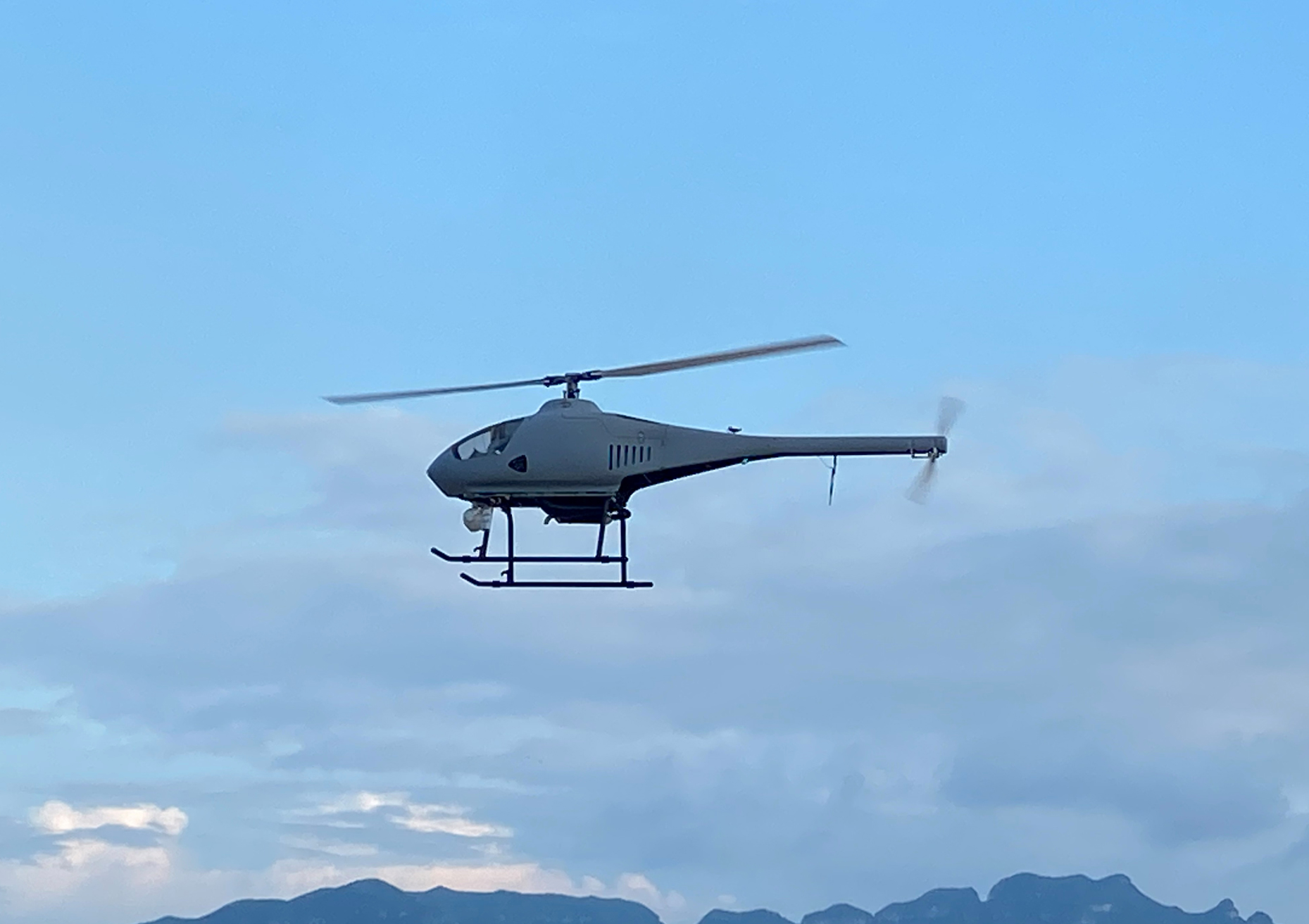 Drone helicopter for delivering 